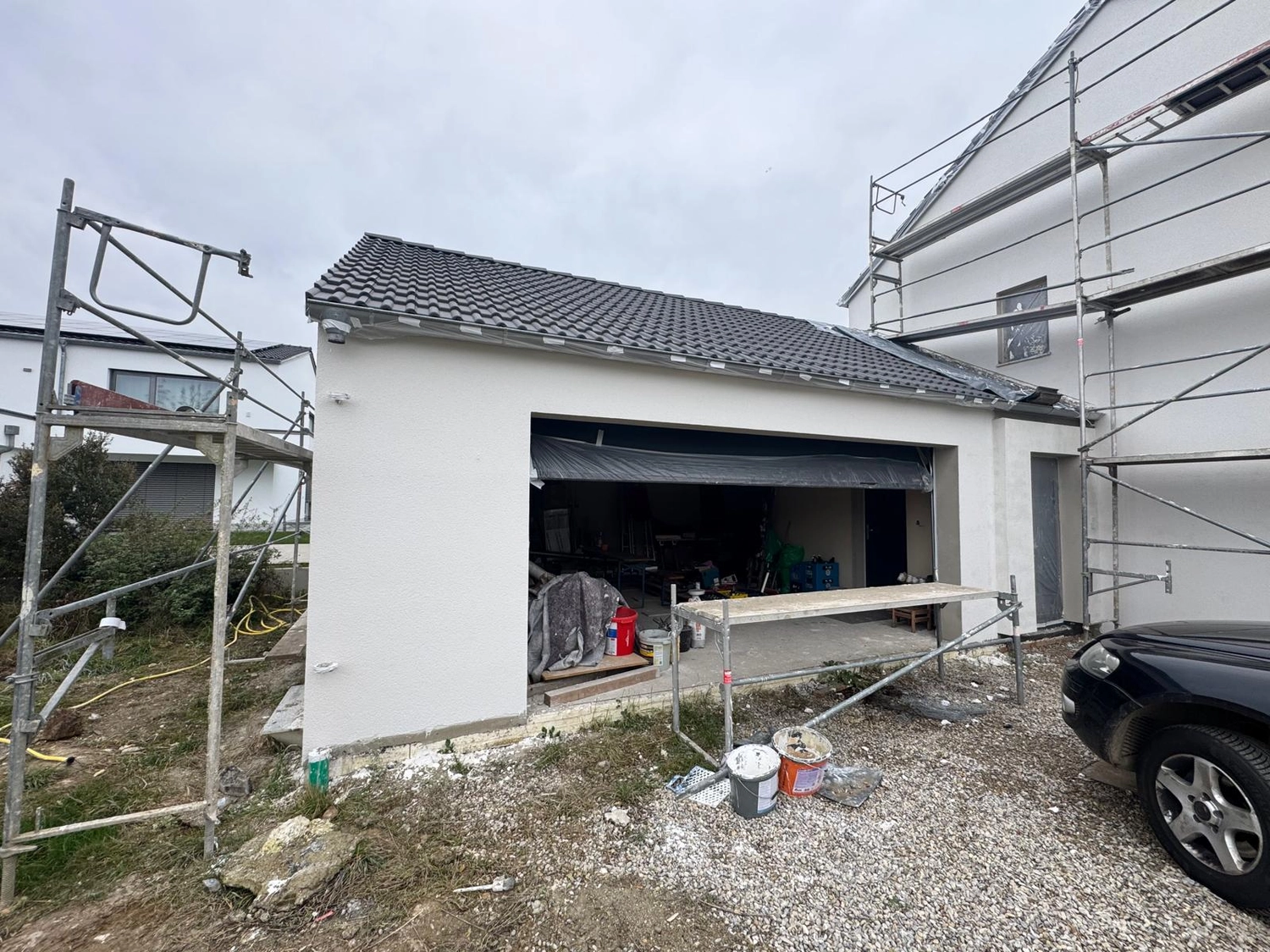 Verputztechnik  Ingolstadt - Verputzen der Garagenwand